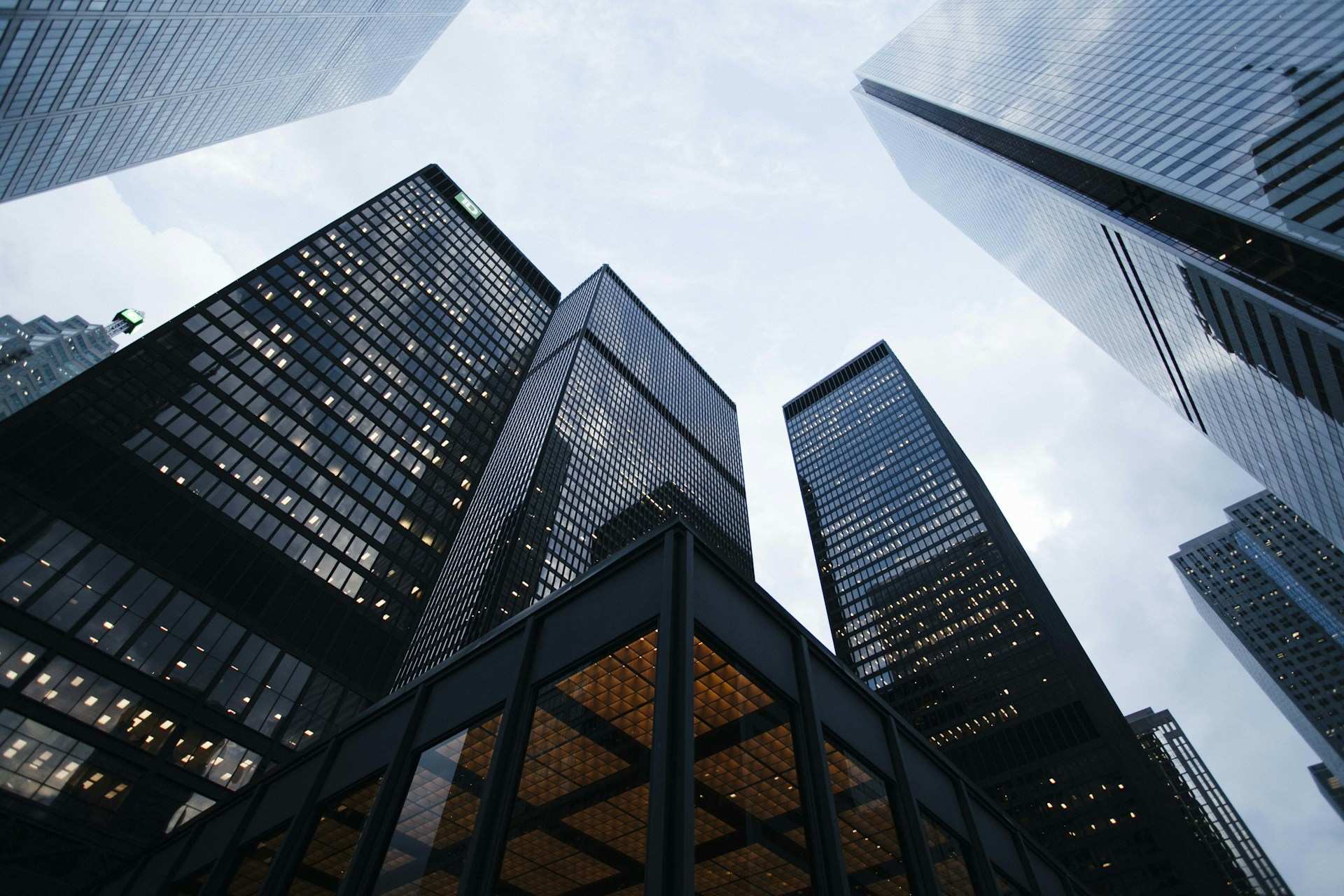 Glass office tower exterior at street level